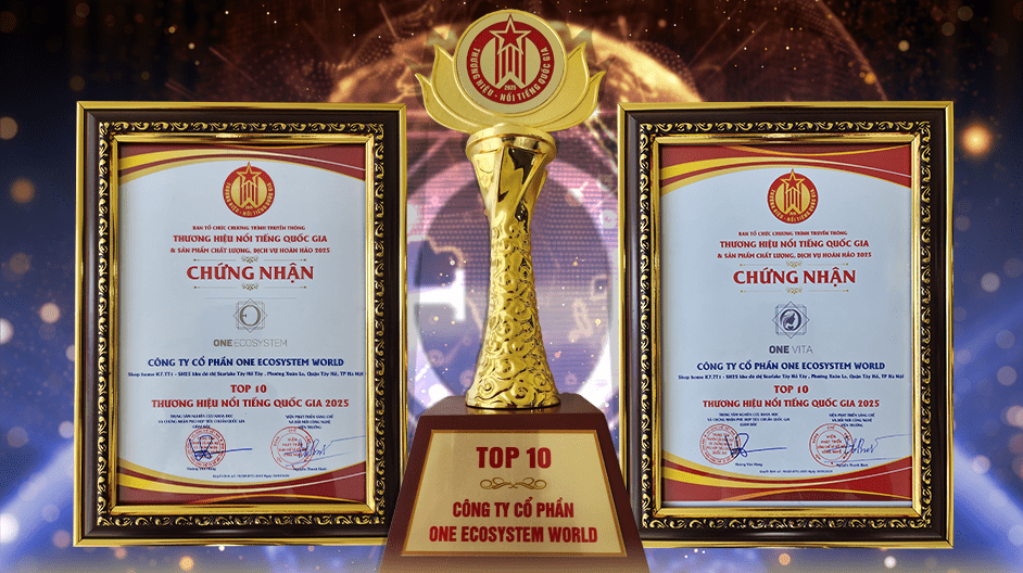 Top 10 Công ty Cổ Phần One Ecosystem World" se encuentra sobre un fondo de brillo azul y dorado entre dos marcos de fotos que indican One VITA y la marca nacional certificada vietnamita.